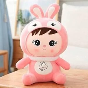 child wearing rabbit cap soft toy